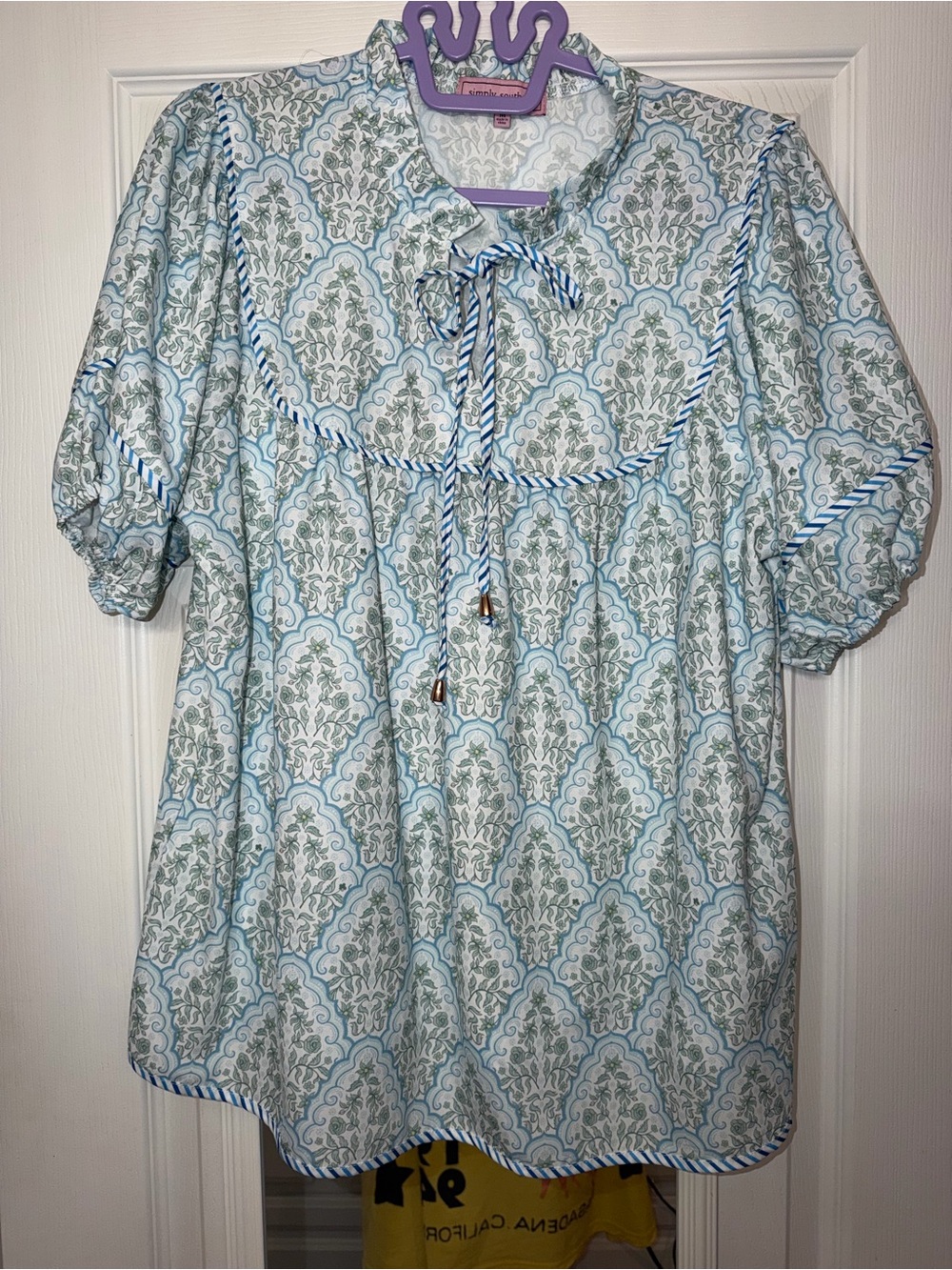 Simply Southern top features a white and blue paisley print
